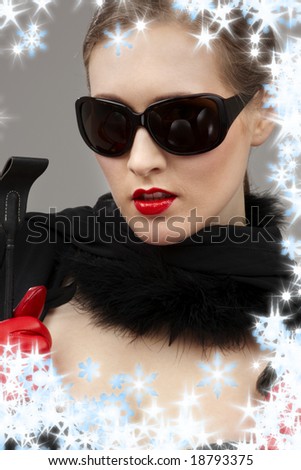 lady in black dress and red gloves with crop