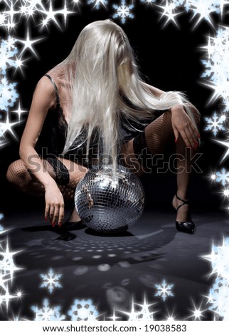 party dancer girl in fishnet stockings with disco ball