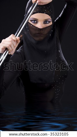picture of ninja woman with shining pole