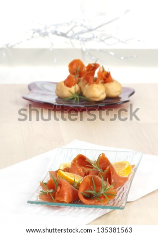 two plates of salmon with empty space between them