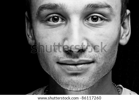 Close up portrait of young man. Black and white.