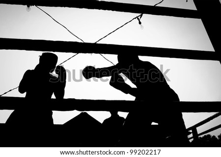 Silhouette boxing fight