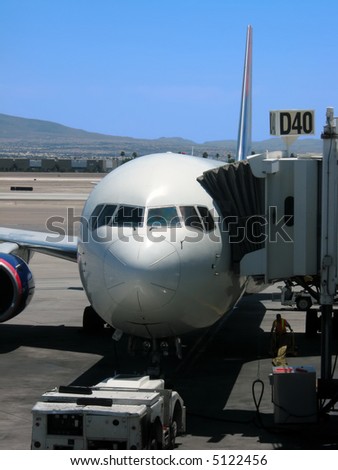 Airplane parked at gate at McCarran International Airport in Las Vegas, Nevada.