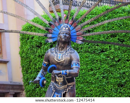 Statue of dancing indian in the colonial city of Queretaro, Mexico.