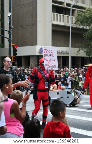 ATLANTA - AUGUST 31: Someone dressed as Deadpool advertises \