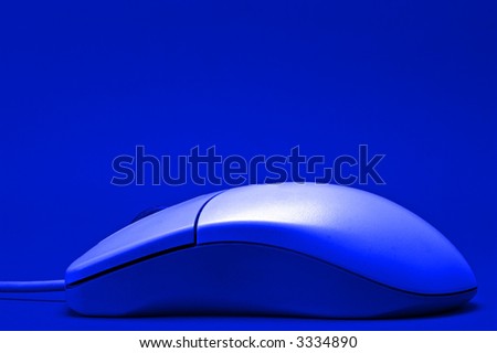 side view of computer mouse in blue tones