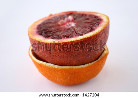 orange fruit and orange peel on white background