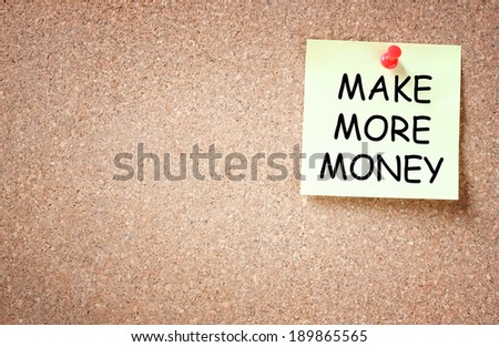 sticky with the phrase make more money written on it. room for text.