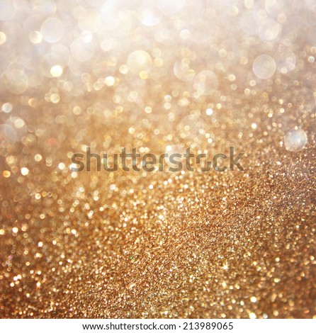 Abstract gold background with copy space . gliiter bokeh lights
