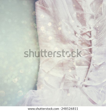 Vintage wedding dress corset background with glitter overlay. wedding concept. filtered image