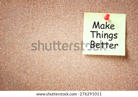 sticky note pinned to cork board with the phrase make things better written on it room for text