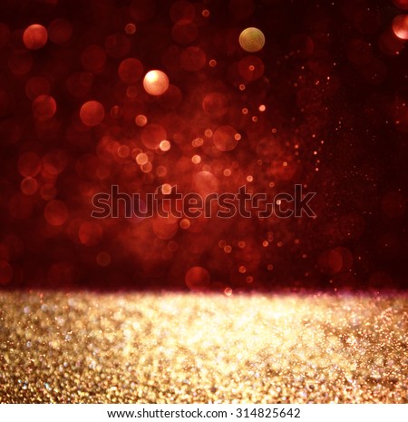 abstract background of red and gold glitter bokeh lights, defocused