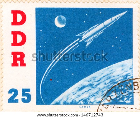 GERMANY - CIRCA 1963: An old German Democratic Republic postage stamp issued in honor of the Soviet spacecraft Vostok and second human to orbit the Earth, cosmonaut Gherman Titov; series, circa 1963