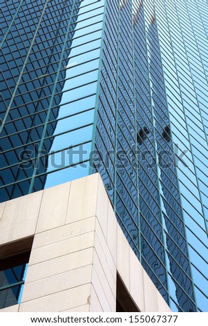 Glass, Steel and Concrete - fragment of new business and financial district as futuristic backgrounds