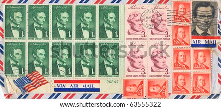 USA - CIRCA 1959: A used old envelope and stamps showing President Benjamin Franklin and President Abraham Lincoln Portraits with inscriptions \