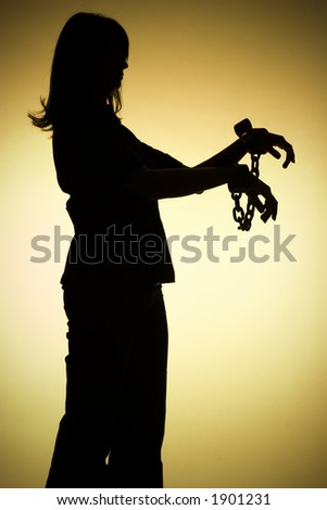 isolated on gold silhouette of woman with chains