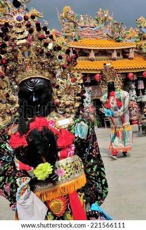 Taipei,Taiwan - July 7th : the 7th Lord and 8th Lord, who bring the souls of the dead before the judge, they patrol together in territorial circumventing ceremony on July 7th, 2011 in Taipei, Taiwan