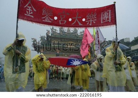 Tainan, TAIWAN March 4th :Jin Luan sent the Royal ship ceremonies conducted in the storm, marching under the banner leading the flag go on March 4th ,2012 in Tainan, TAIWAN