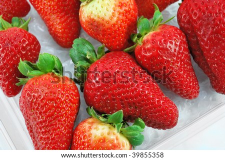 Berries of strawberry in plastic packing, close-up