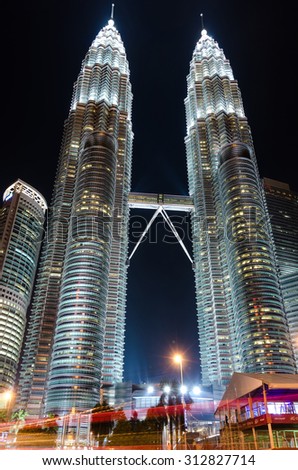 KUALA LUMPUR, MALAYSIA - JULY 31, 2015: Petronas Twin Towers during the day on July 31, 2015 in Kuala Lumpur. They are the tallest twin towers in the world