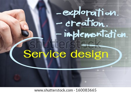 Businessman writing a Service Design concept, development of customer relationship management