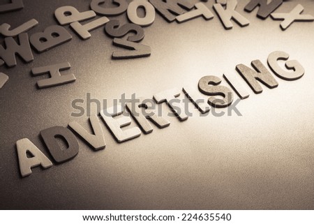 Advertising word topic in wood letters