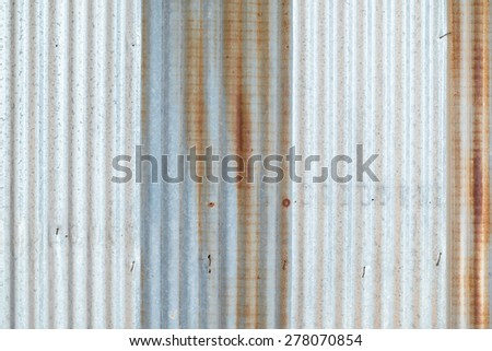 Galvanized iron as corrugated sheet wall with rust