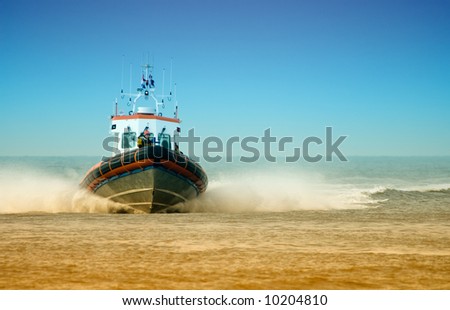 coast guard full speed towards the beach