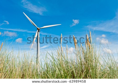 wind turbine and sand dunes in the netherlands