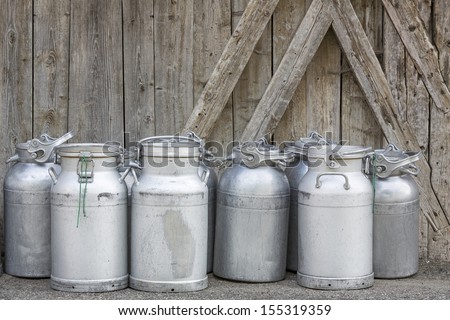 Vintage milk cans in rural Northern Italy