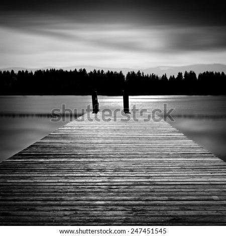 Jetty on a lake in Bavaria, Germany, long time exposure
