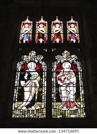 YORK, UK - APRIL 4: Stained glass window in York St. Mary\'s Church on April 4, 2013 in York. The church is currently displaying the shortlisted works for the Aesthetica Art Prize.