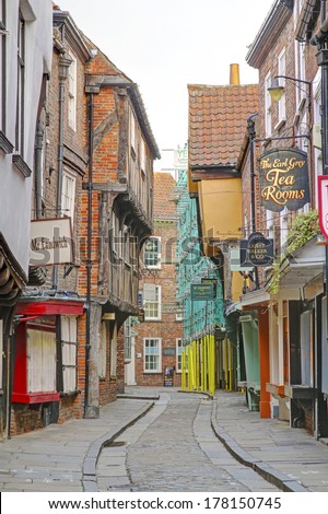 YORK,UK - FEBRUARY 2014: The Shambles with timber-framed buildings,   York, 20 February, 2014. York\'s 30th Jorvik festival explores the Viking world of myths and legends from the 15th February 2014