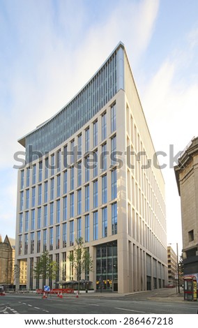 MANCHESTER, UK - JUNE 6, 2015: Office block. Manchester City Council hopes that Home will boost the economy by attracting other businesses to this part of the city centre.