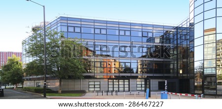 MANCHESTER, UK - JUNE 6, 2015: Office building. Manchester City Council hopes that Home will boost the economy by attracting other businesses to this part of the city centre.