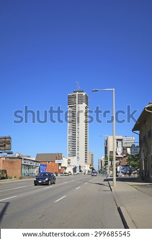 HAMILTON, ONTARIO - JULY 20, 2015: Main Street, Hamilton. Hamilton is the centre of a densely populated and industrialized region at the west end of Lake Ontario