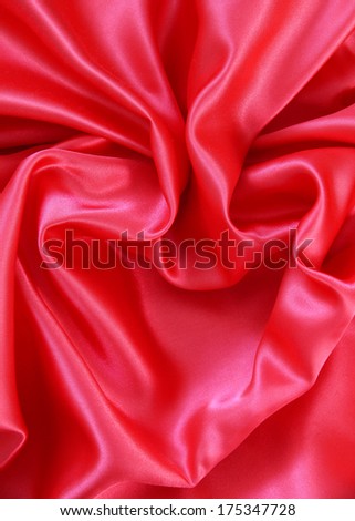 Red heart from elegant red silk for St Valentine's day background