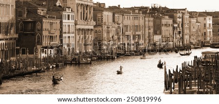 VENICE, ITALY - SEPTEMBER 21: Grand Canal of Venice on September 21, 2013.The famous Grand Canal from Rialto bridge at sunset.  In Sepia toned. Retro style