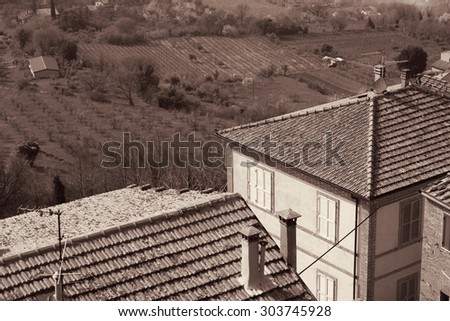 taly. Tuscany region. Montepulciano town in spring. In Sepia toned. Retro style