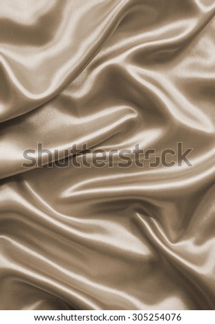 Smooth elegant brown silk or satin can use as background. In Sepia toned. Retro style