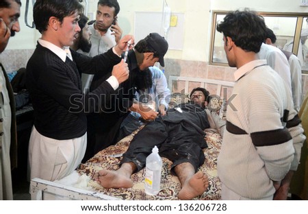 QUETTA, PAKISTAN - APR 23: Victim of Gawalmandi area bomb blast is being treated at  Civil Hospital on April 23, 2013 in Quetta. Several people were injured in three back-to-back blasts in Quetta.