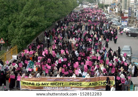 KARACHI, PAKISTAN - SEP 04: Supporters and activists of Jamat-e-Islami (JI) demonstrating in favor of Hijab, The Muslim women veil; as they are marking Hijab Day,  on September 04, 2013 in Karachi.