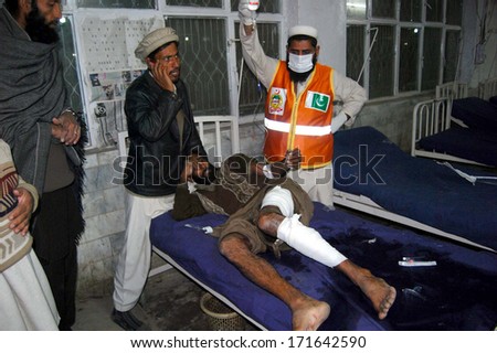 PESHAWAR, PAKISTAN - JAN 16: Victims of bomb blast at a Tableeghi Markaz (Islamic  preaching centre and mosque) admitted for treatment at Lady Reading Hospital on January 16, 2014 in Peshawar.