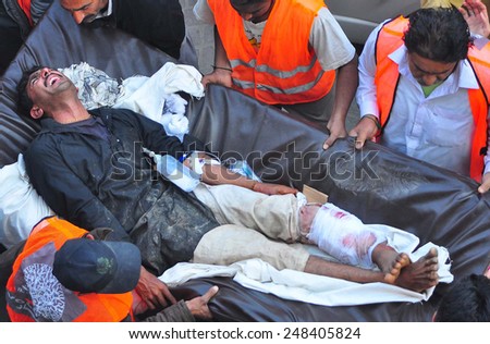 LARKANA, PAKISTAN - JAN 30: Injured of suicidal bomb blast which occurred onto a mosque of Shikarpur during Friday prayer, are being shifting to Hospital on January 30, 2015 in Larkana.