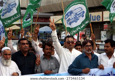 KARACHI, PAKISTAN - APR 28: Members of All Karachi Water-Tankers Ittehad chant slogans against water board administration during protest demonstration on April 28, 2015 in Karachi.