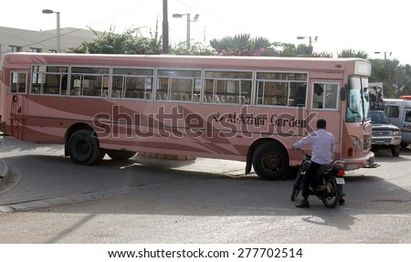 KARACHI, PAKISTAN - MAY 13: The bullet riddle bus is being driving towards Ismaili Jamat Khana as the six unidentified assailants on motorbikes opened fire on a bus on May 13, 2015 in Karachi