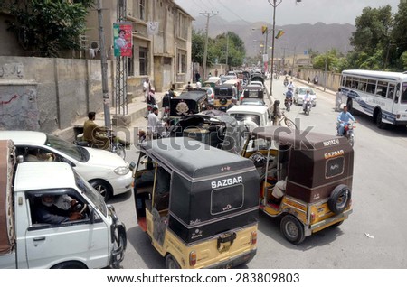 QUETTA, PAKISTAN - JUN 02: Traffic jam due to closure of many road for security arrangement as security has been tighten in city during the visit of Prime Minister on June 02, 2015 in Quetta.