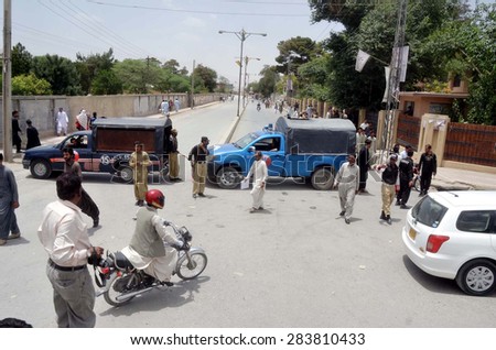 QUETTA, PAKISTAN - JUN 02: Security officials of stand alert to avoid untoward incident as security has been tighten in city during the visit of Prime Minister on June 02, 2015 in Quetta.