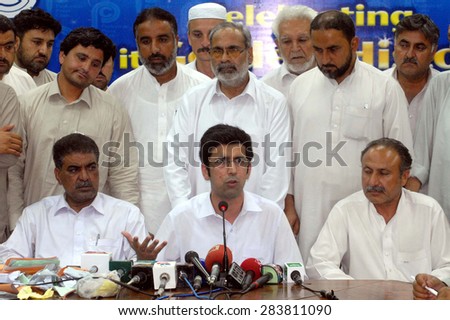 PESHAWAR, PAKISTAN - JUN 02: Khyber Pakhtunkhwa Minister for Health, addresses to media persons during press conference regarding rigging in local government election on June 02, 2015 in Peshawar.