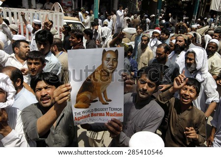 PESHAWAR, PAKISTAN - JUN 08: Members of Traders Community are protesting against \
massacre of Rohangya Muslims in Burma during demonstration in Peshawar on Monday, June 08, 2015.